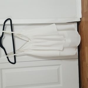 White flowy tank top with zipper detail on the back